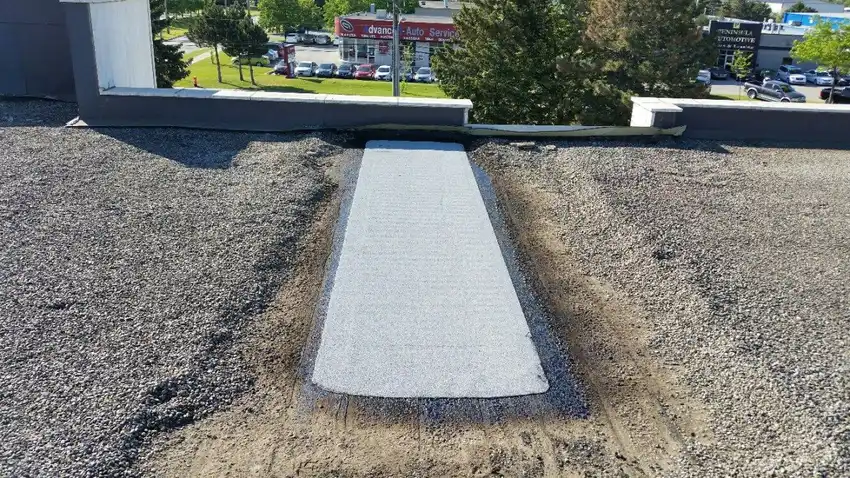 Repaired roof section after an emergency leak call